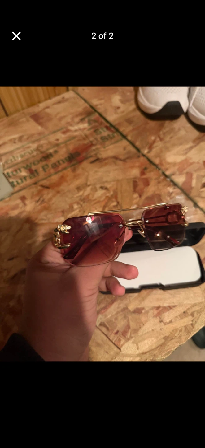 Gold Trimmed Red Tinted Rimless Sunglasses