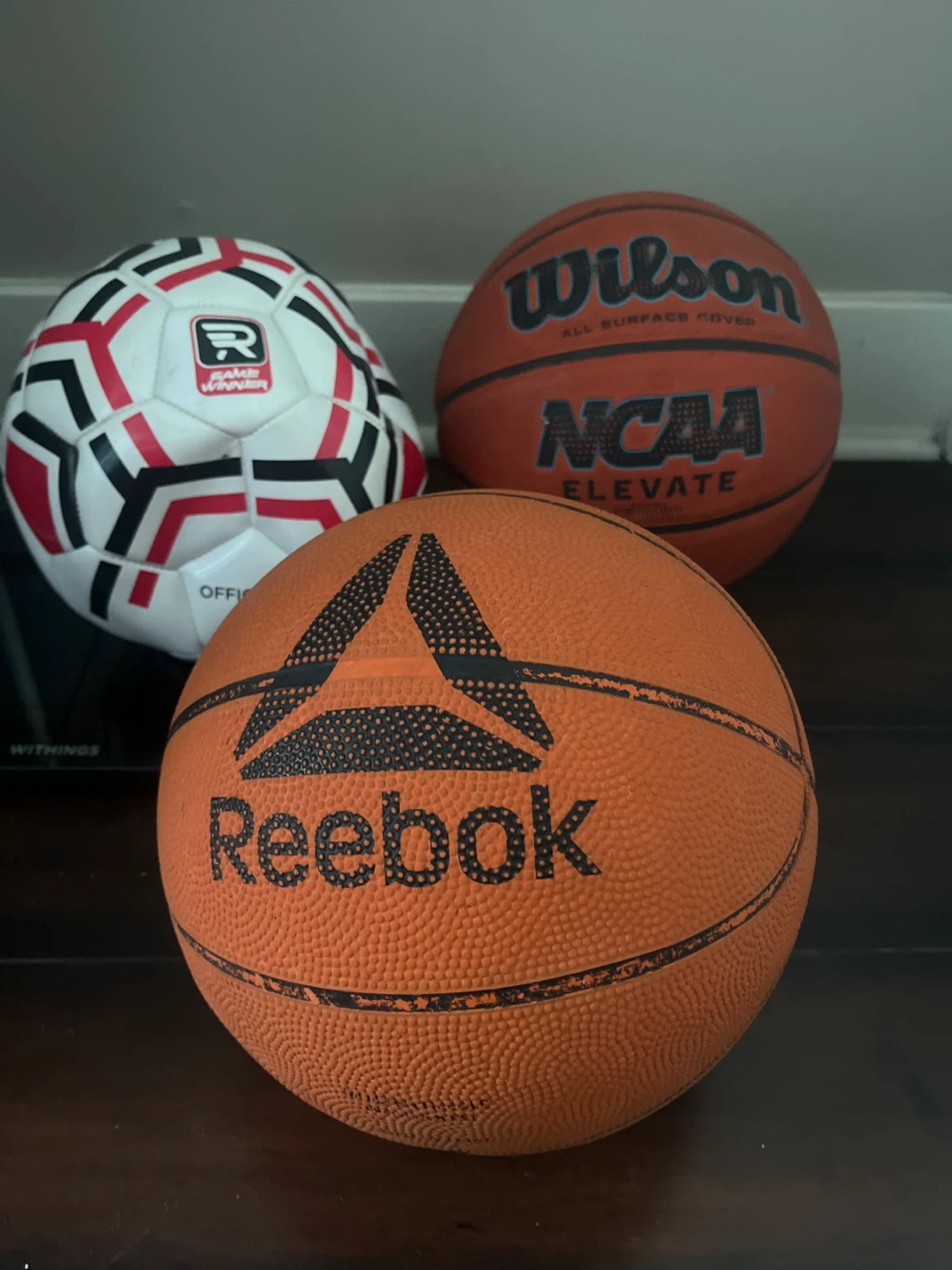 Wilson NCAA Elevate Basketball and Reebok Basketball