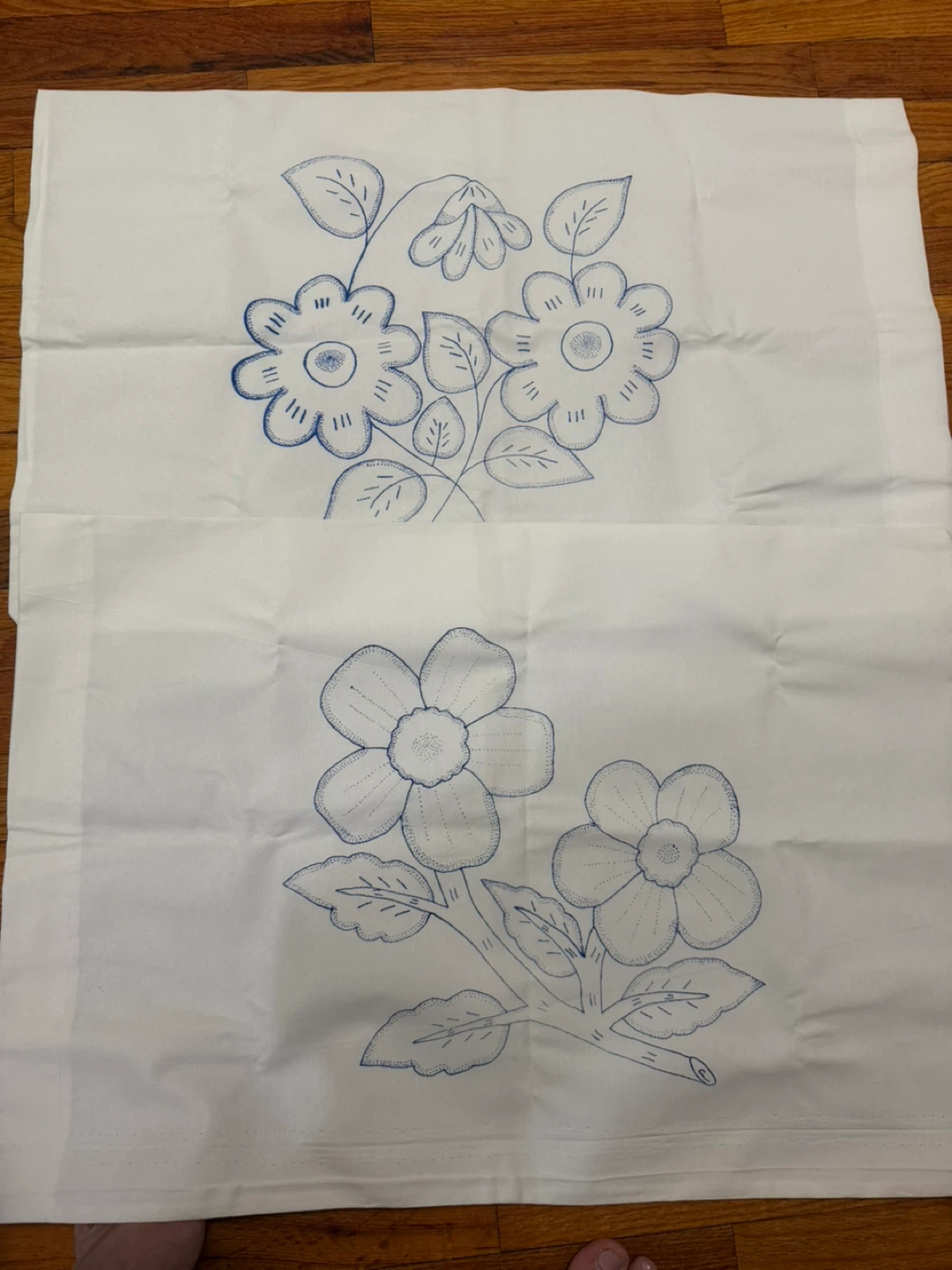 White Fabric with Blue Floral Embroidery