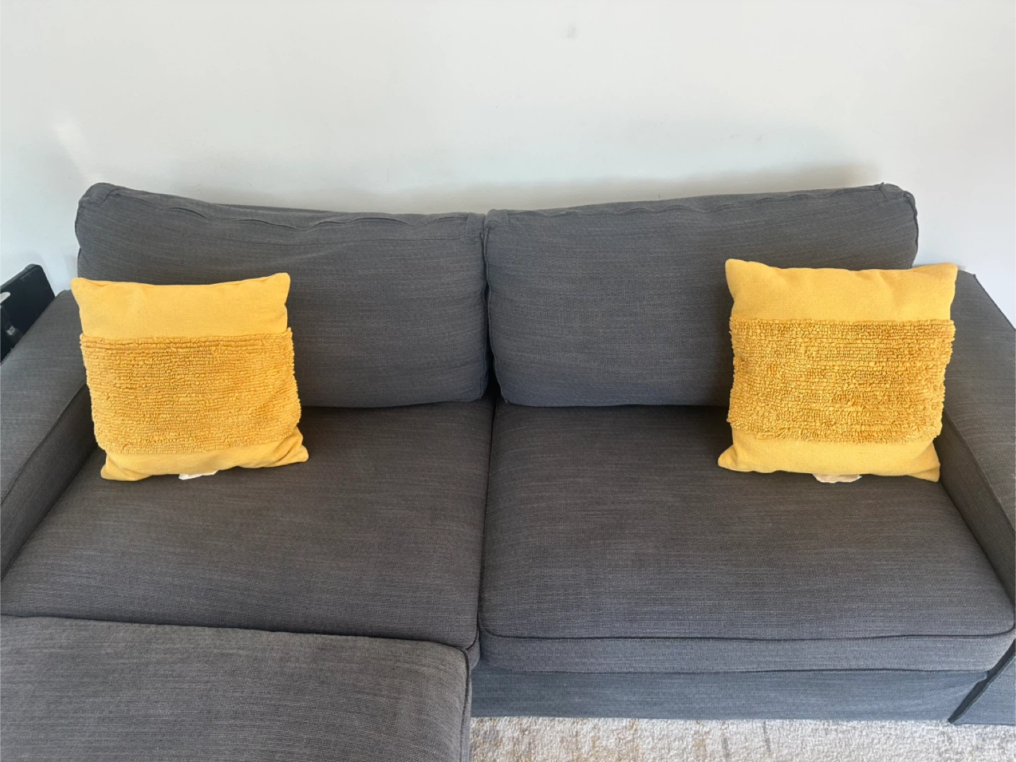 Dark Gray Ikea Sectional Sofa with Chaise and Yellow Pillows - photo 2