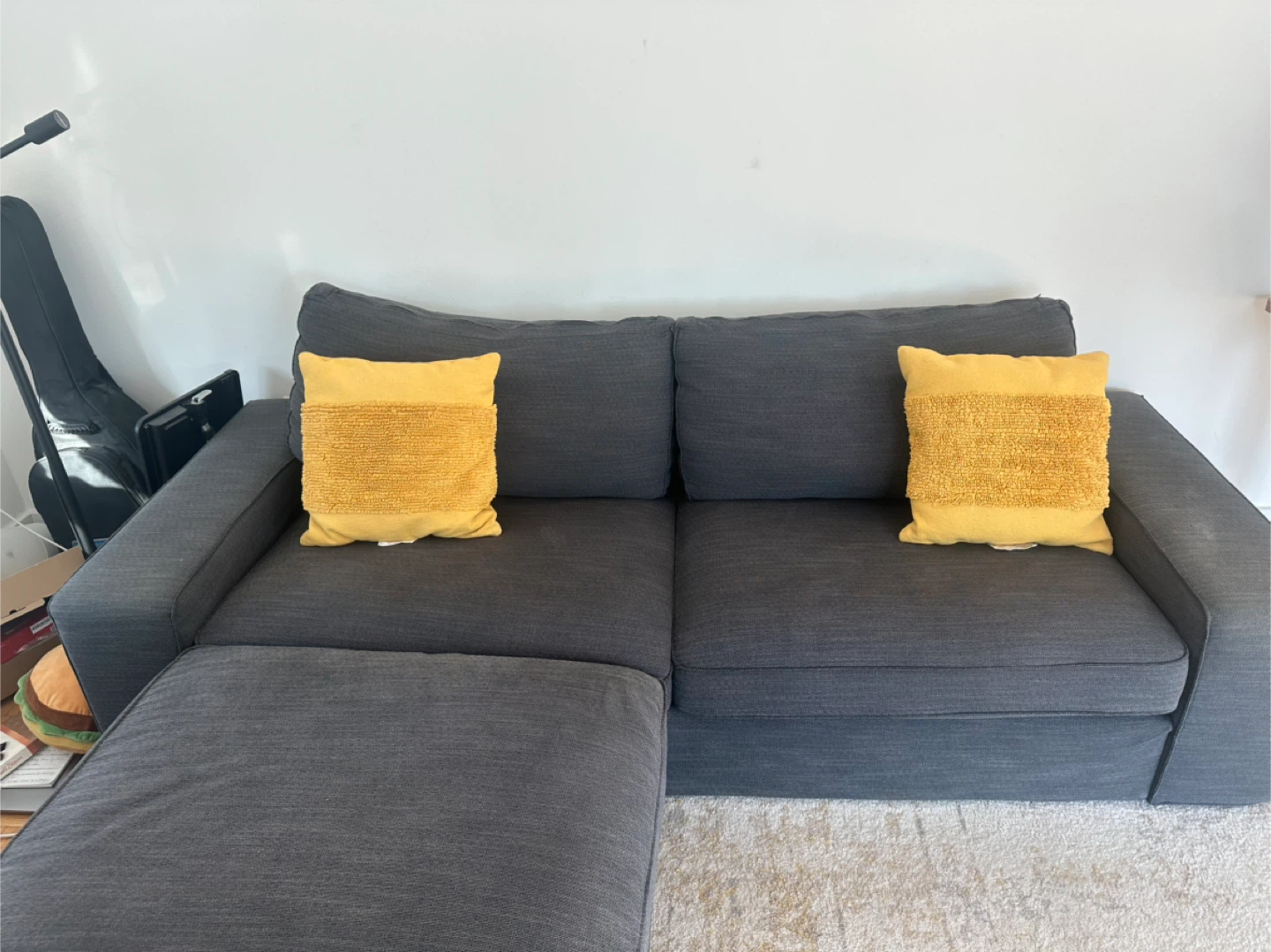 Dark Gray Ikea Sectional Sofa with Chaise and Yellow Pillows - photo 4