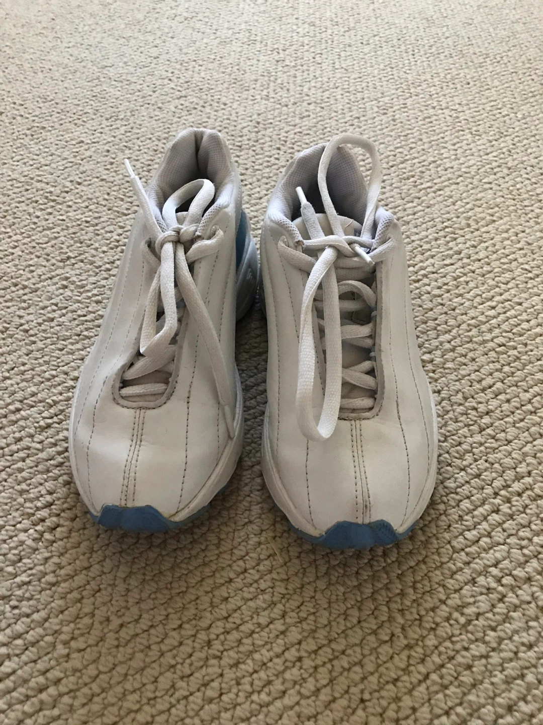 White athletic Fila shoes