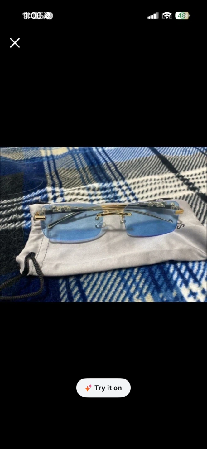 Rimless Blue Lens Sunglasses with Gold Accents