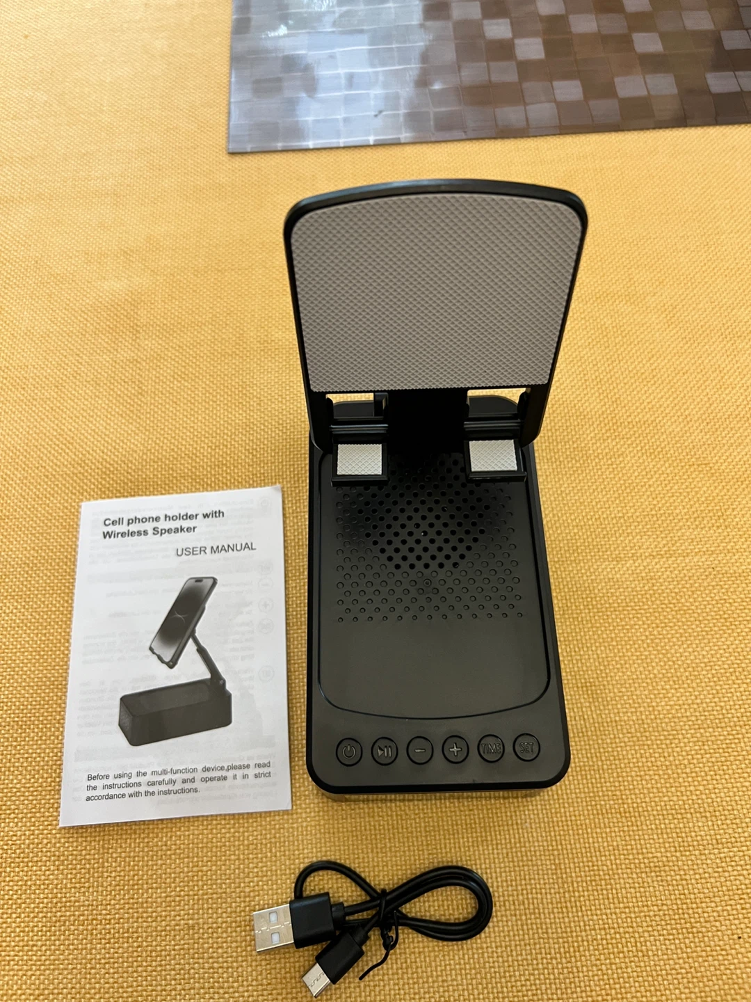 Cell phone holder with wireless speaker - photo 2