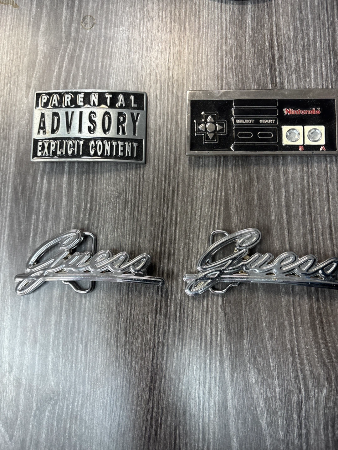 $9.99! Guess Belt Buckles (2) and NES  ControllerBelt Buckle