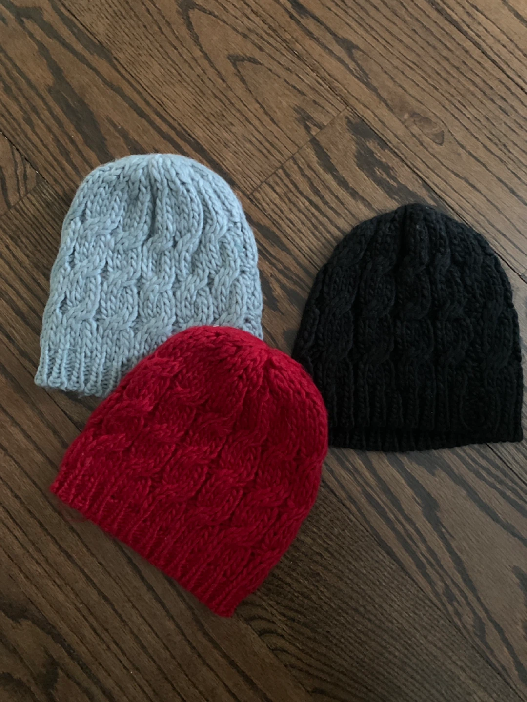 Three Knitted Toques - Red, Black, and Light Grey