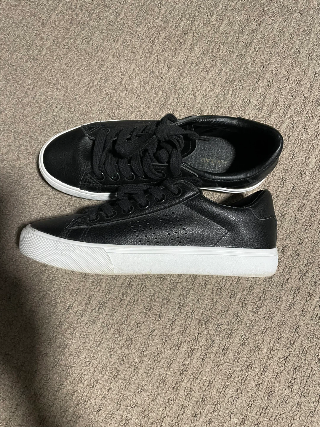 Black Faux Leather Sneakers from le chateau