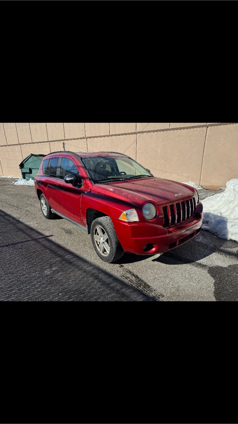 2010 Red Jeep Compass