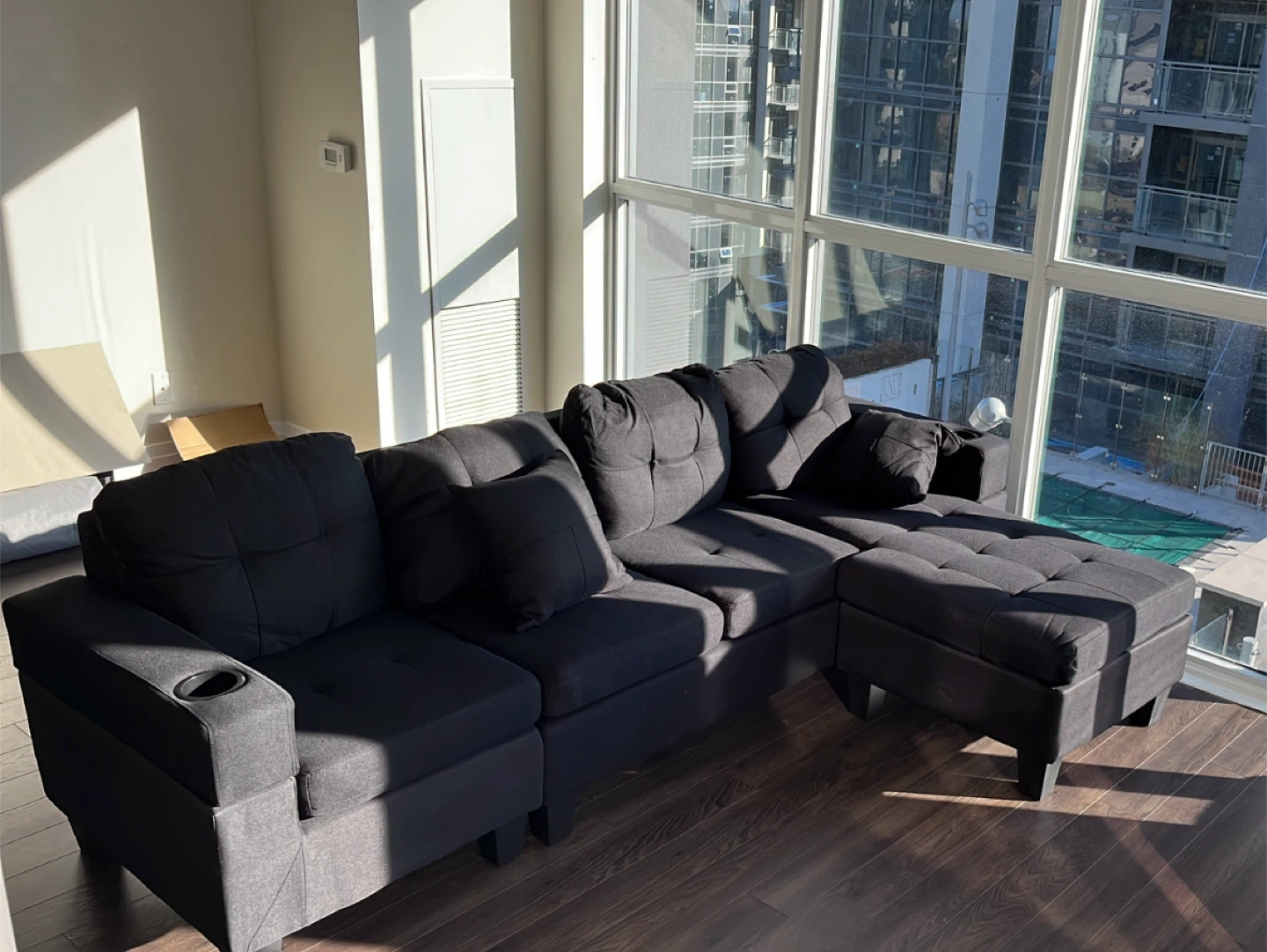 L-Shape Black Sofa with Cover – Move-Out Sale