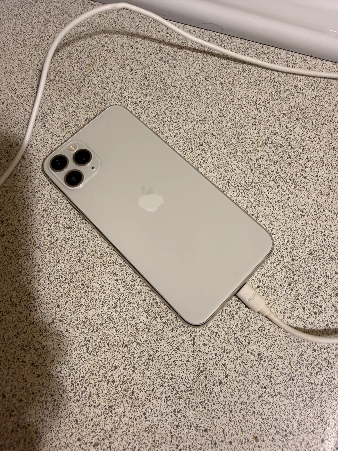 iPhone 11 Pro with Black Case with Ring Stand