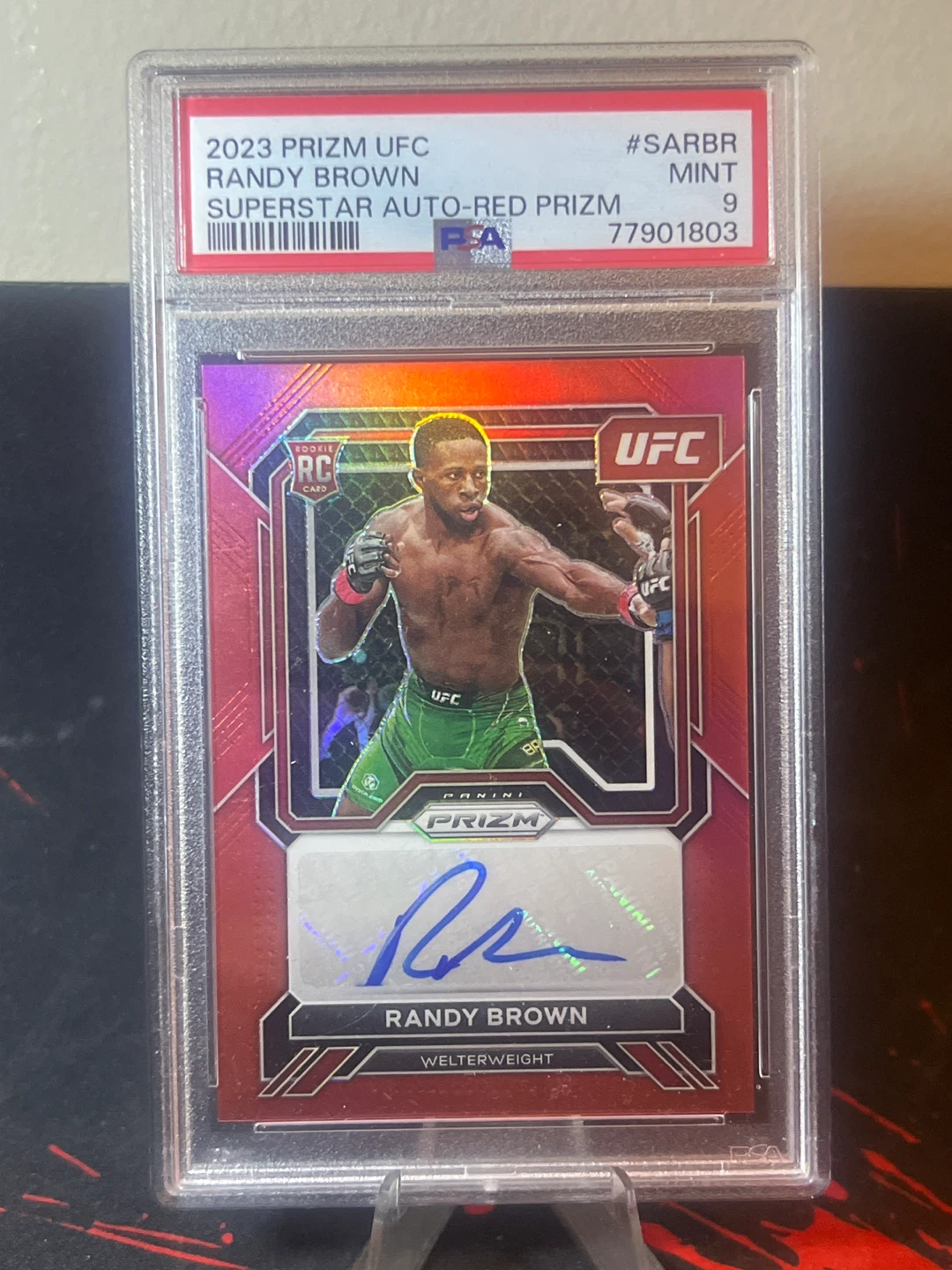 /99 - 2023 Prizm UFC Randy Brown Superstar Auto-Red Prizm Card
