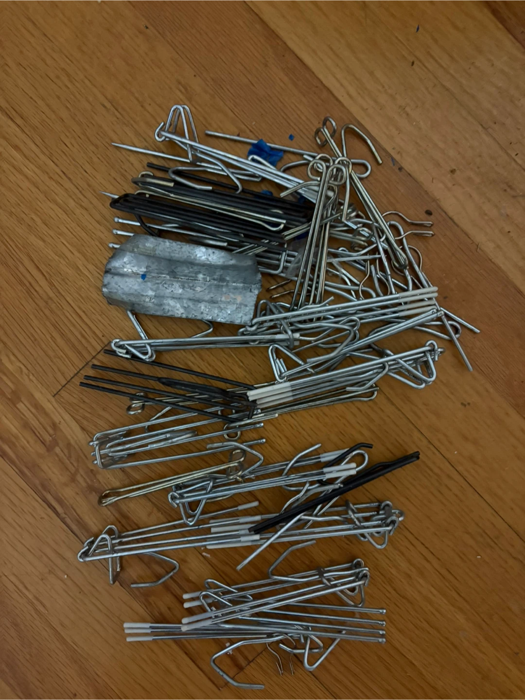 Assorted Metal and Black Curtain Hooks & Rods
