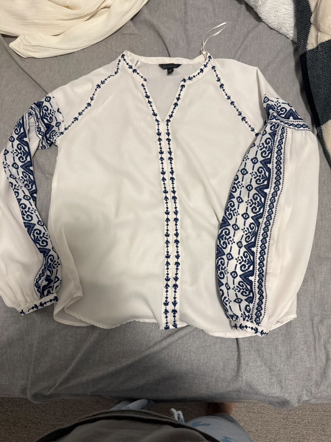 White Blouse with Blue Embroidery