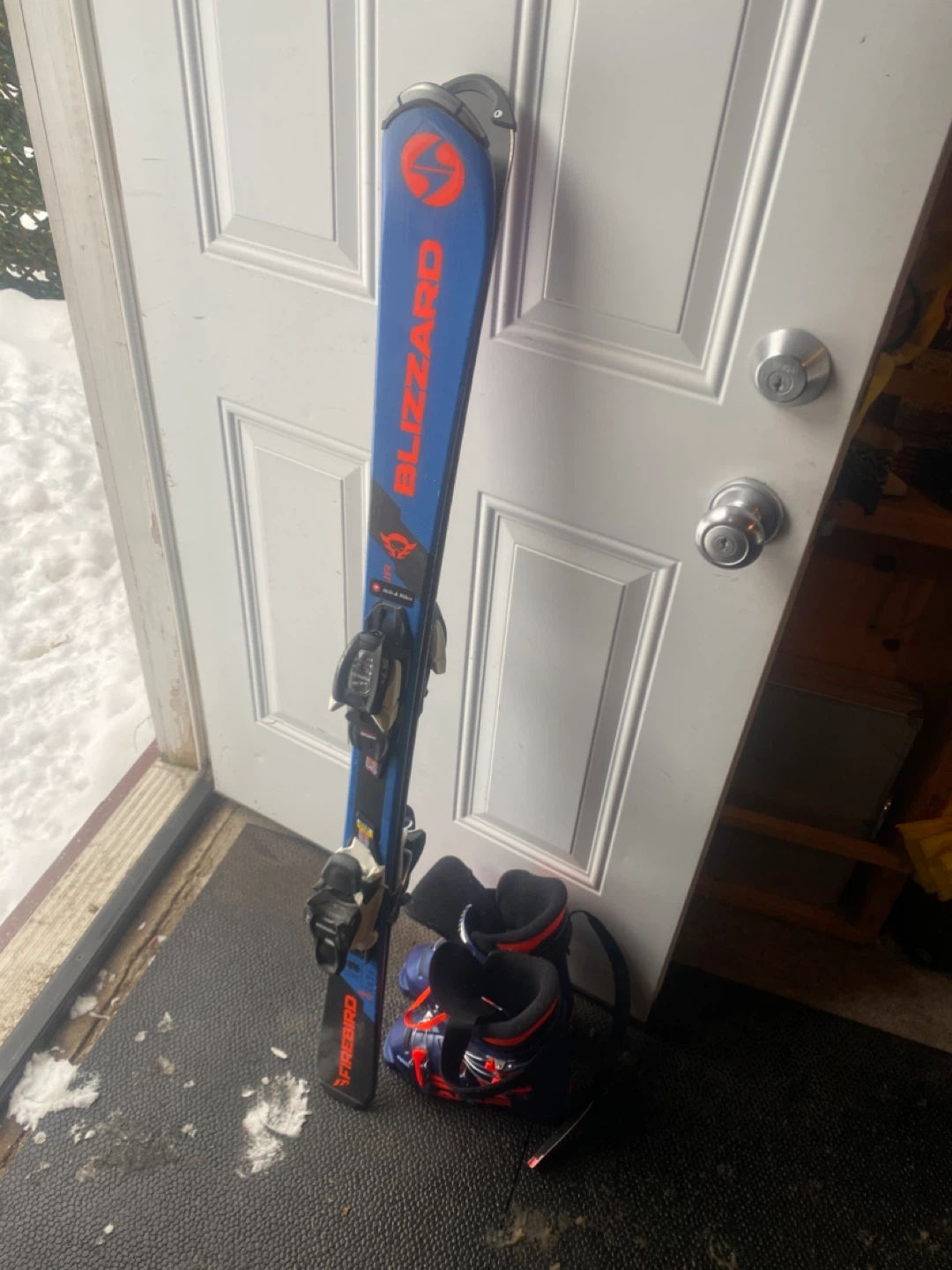 Blizzard Firebird Ski Boots and Skis