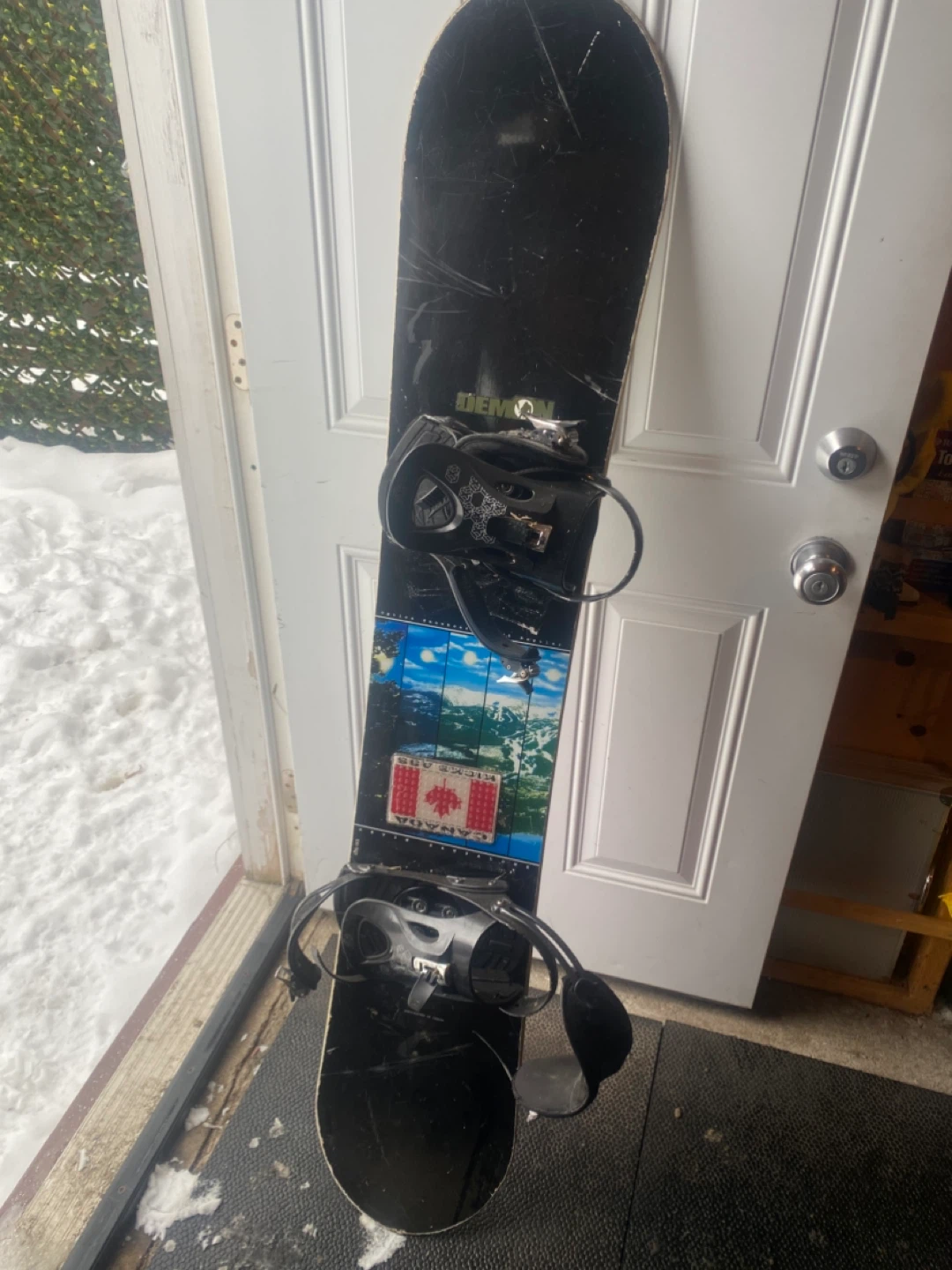 Demon Snowboard with Bindings