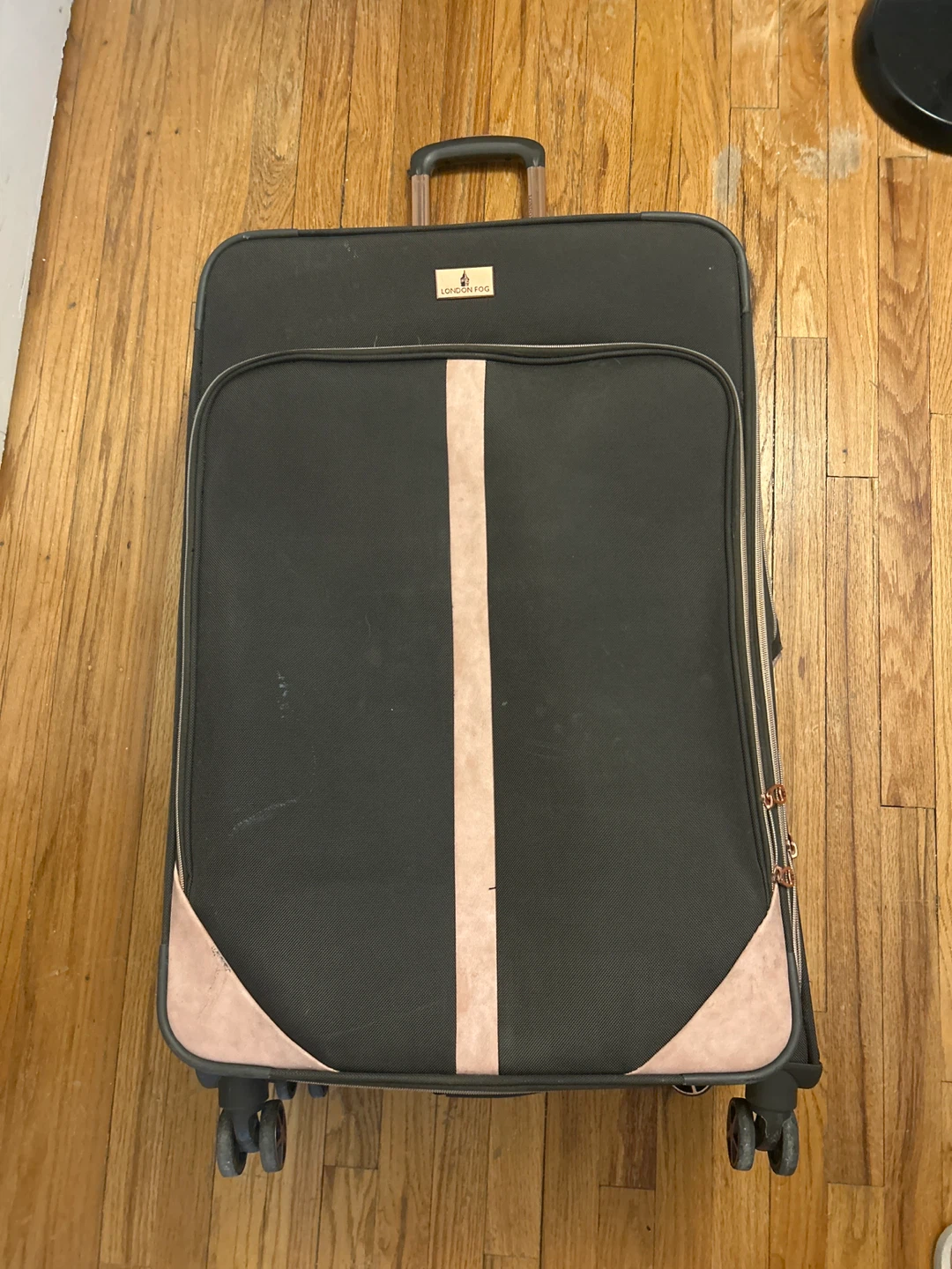 London Fog Black Rolling Suitcase with Rose Gold Accents