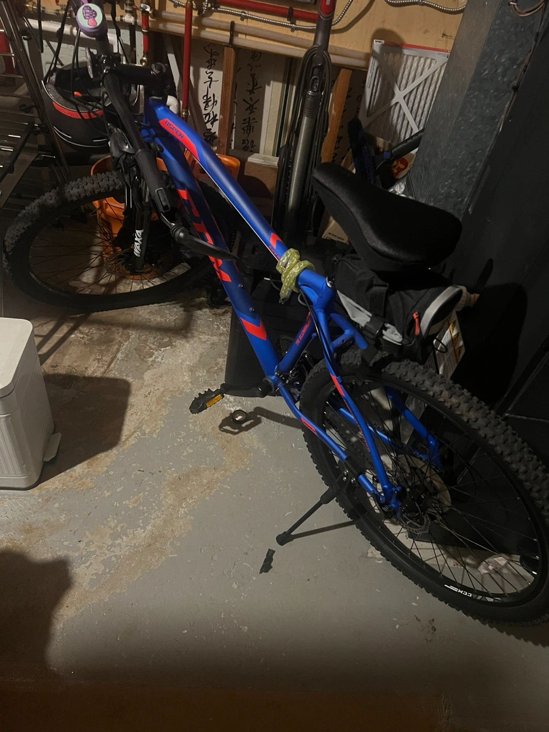 Blue Mountain Bike with Bell Helmet and Pump