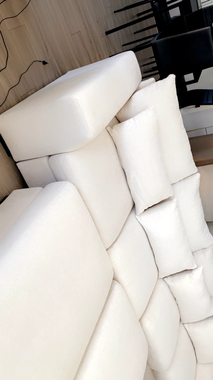 Cream Sectional Sofa with Multiple Cushions