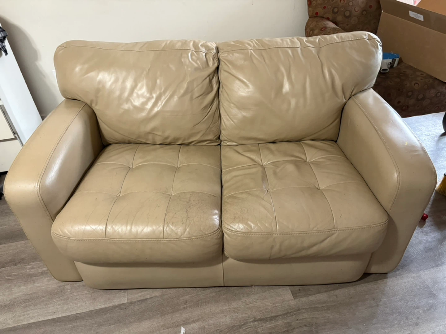 Beige Leather Loveseat