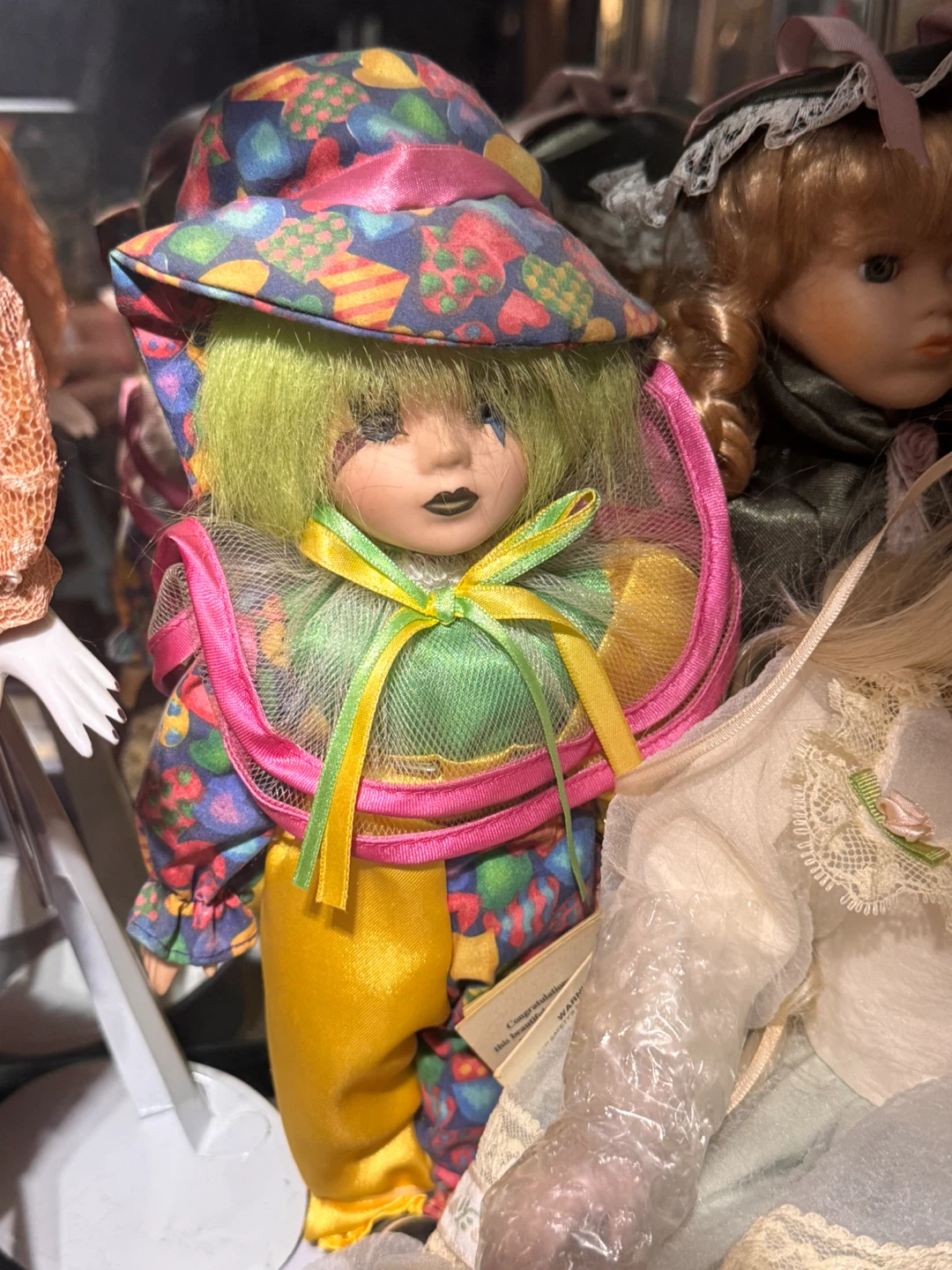 Collectible Porcelain Clown Doll with Colorful Outfit