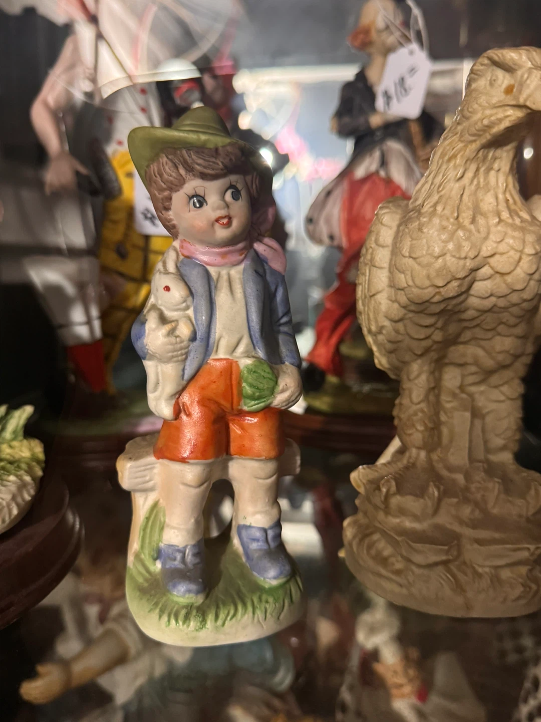 Vintage Ceramic Figurine of a Boy with a Rabbit