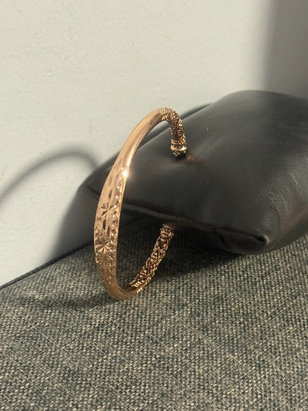 Rose Gold Tone Cuff Bracelet with Intricate Detailing