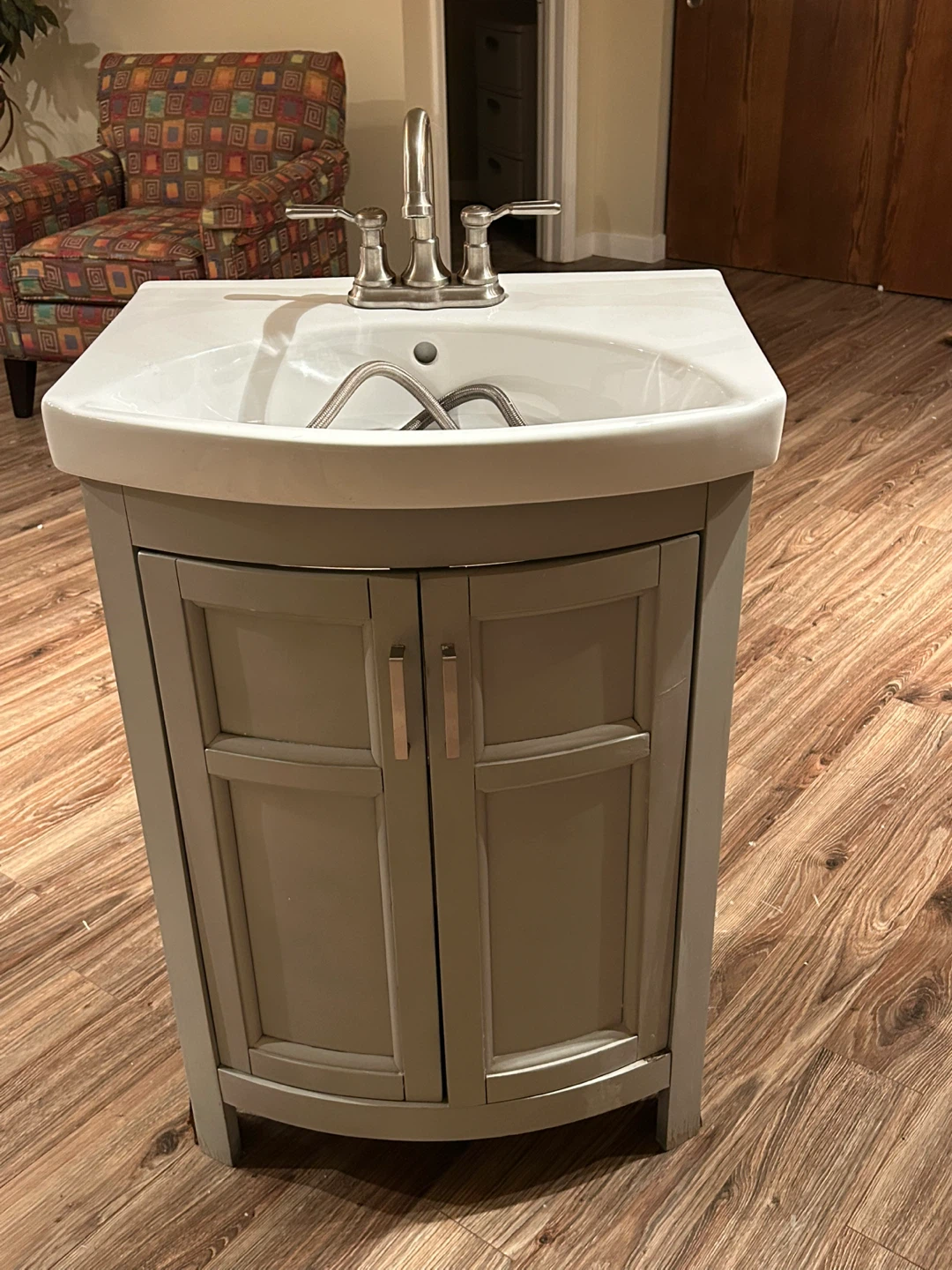 White Vanity Sink with Faucet and Water Hoses