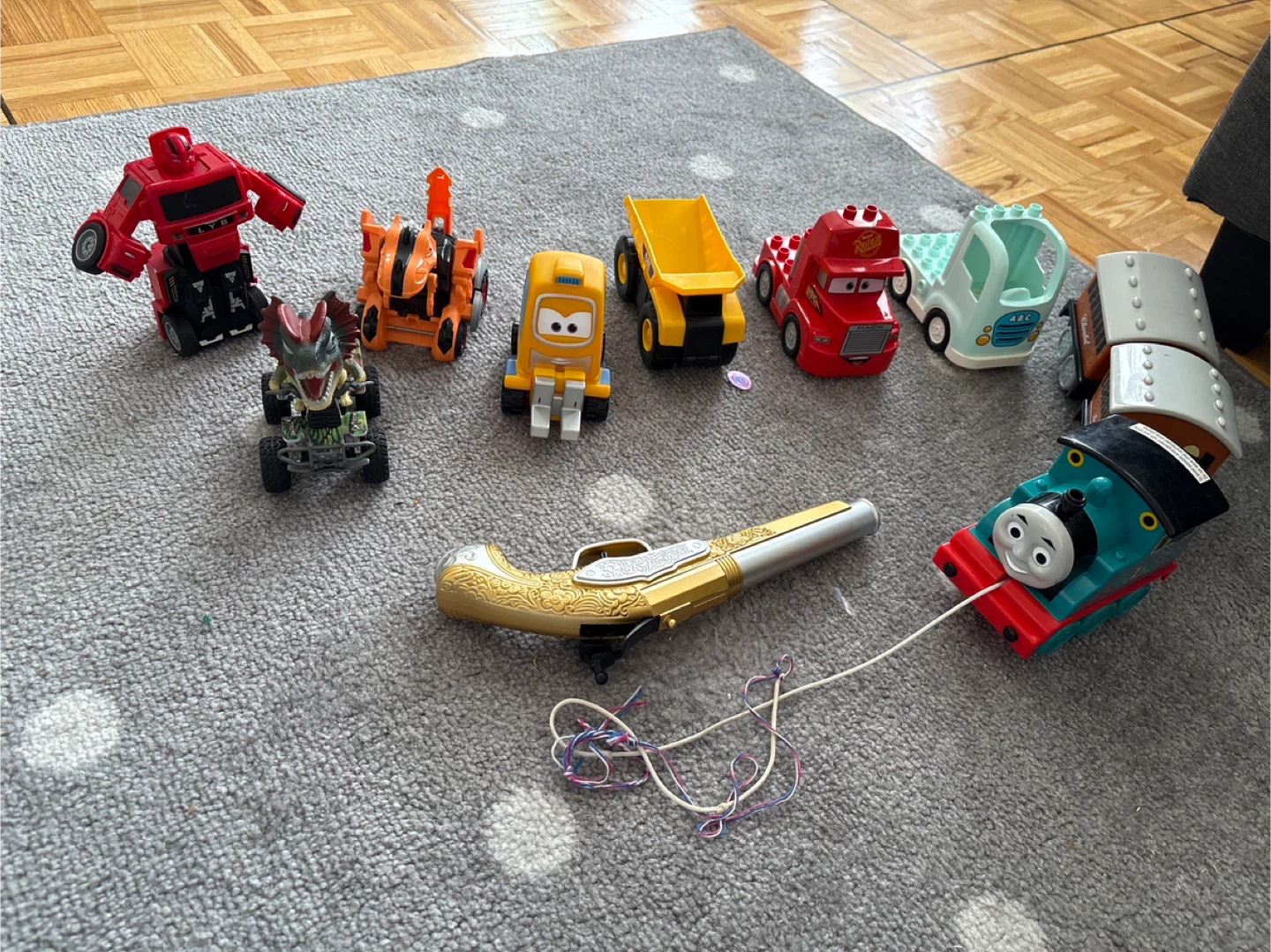 Assorted Toy Vehicles and Toys