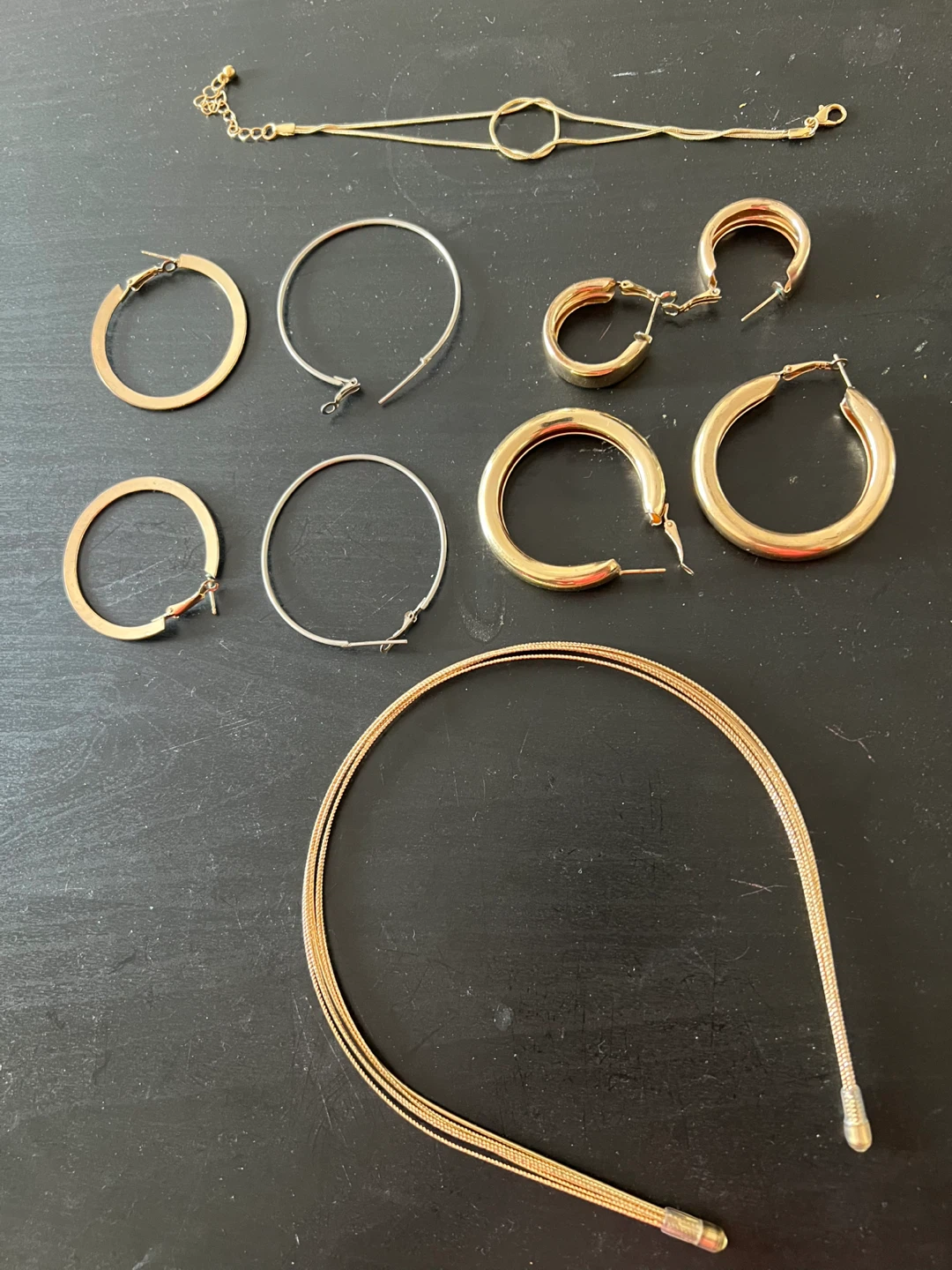 4 hoop earrings + bracelet