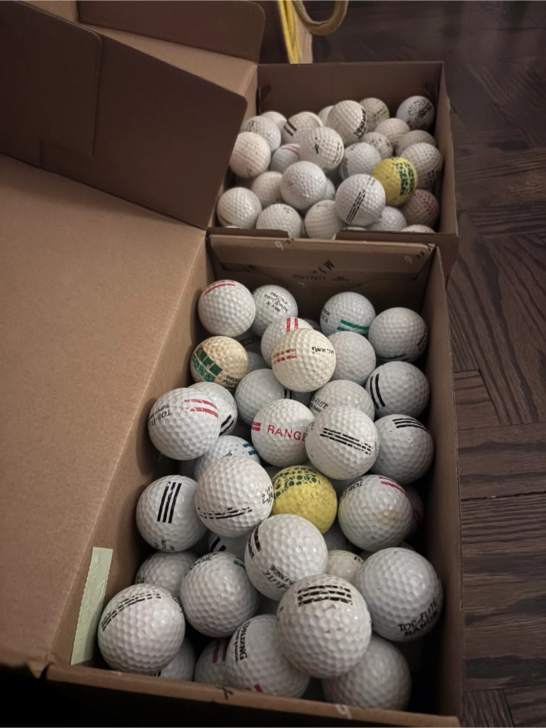 Around 135 Mixed Golf Balls