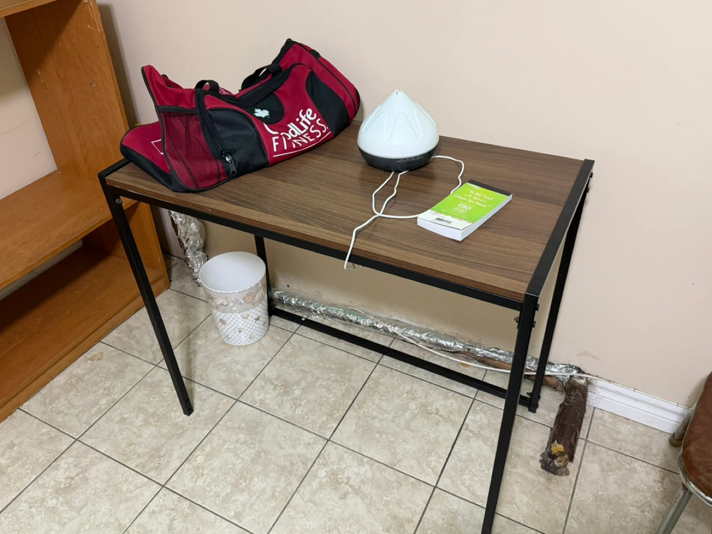 Wood grain desk with black metal frame
