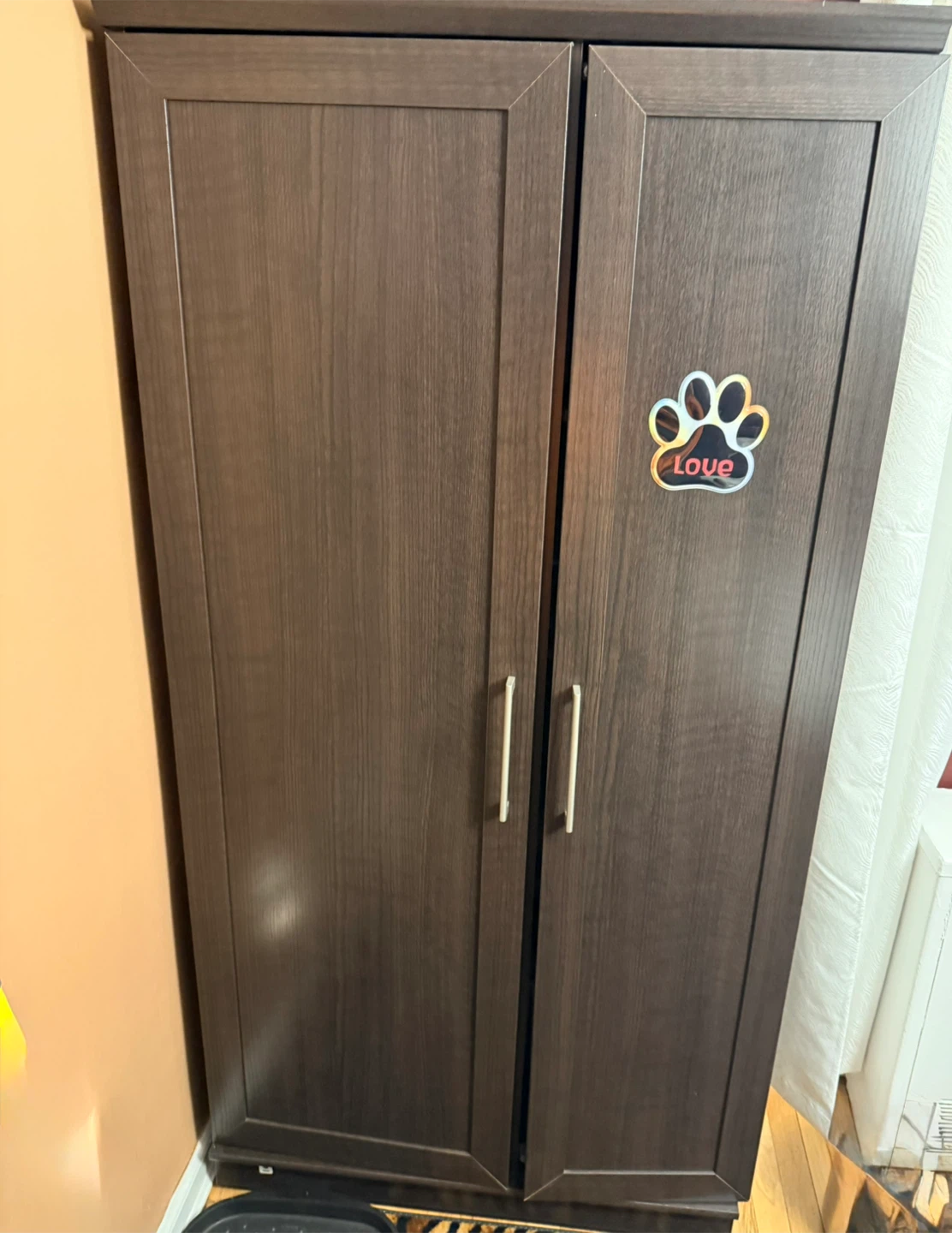 Dark Wood Double Door Cabinet with Paw Print Decal