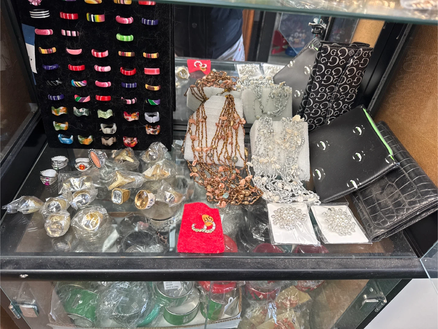 Assorted Costume Jewelry Rings, Necklaces, and Brooches