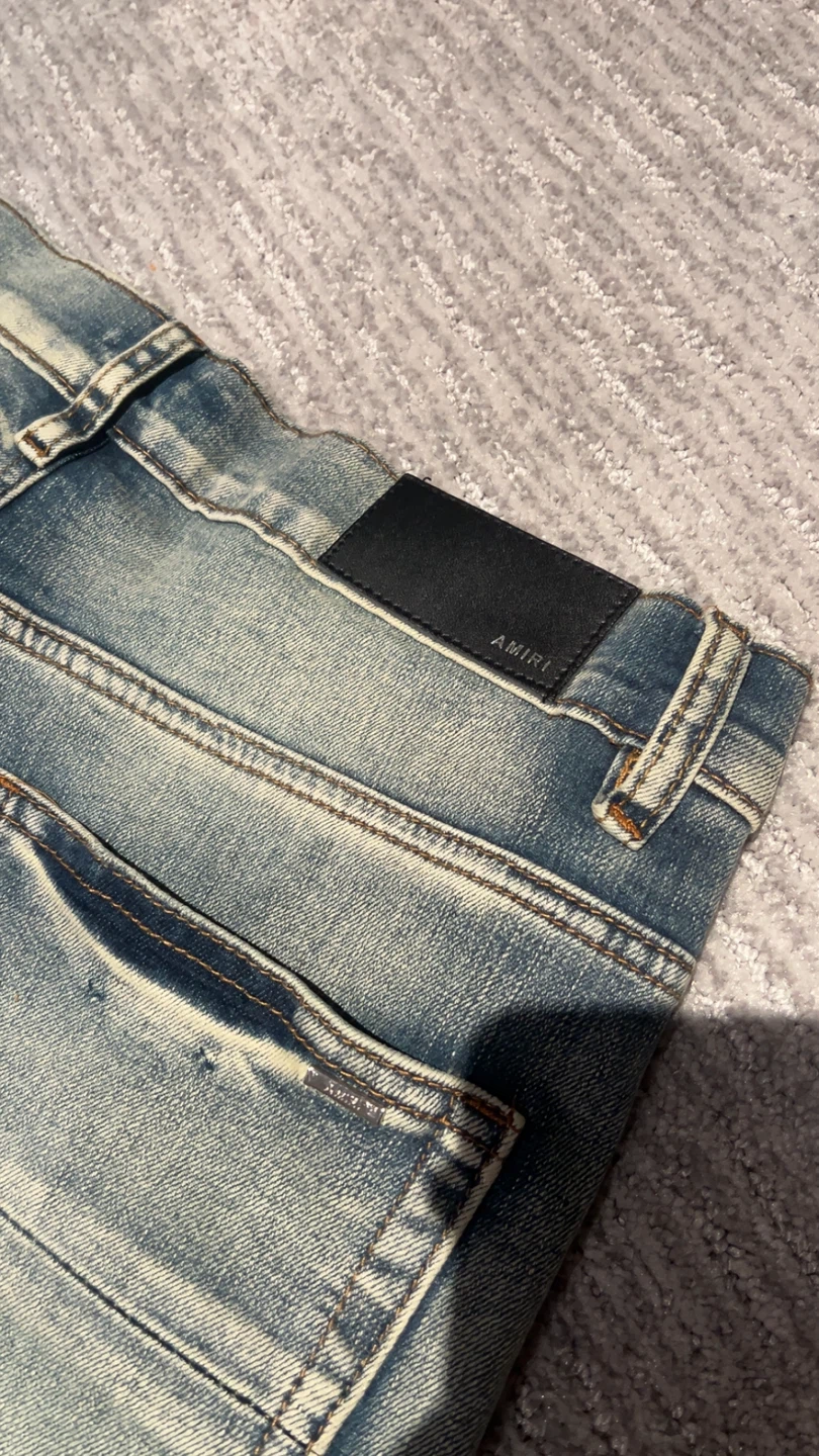 AMIRI Star Embellished Distressed Jeans - photo 4