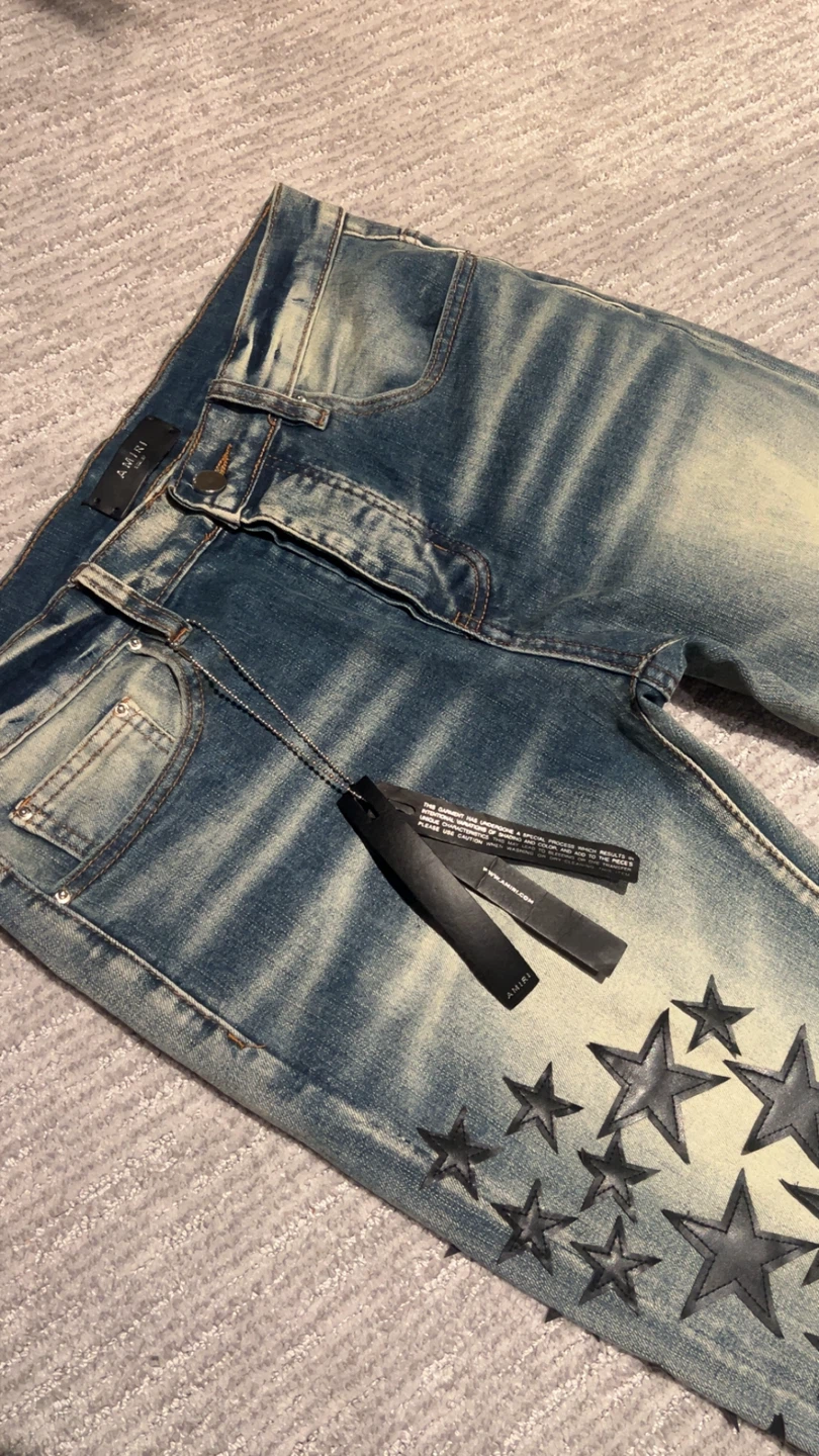 AMIRI Star Embellished Distressed Jeans