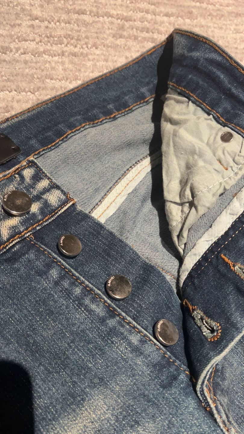 AMIRI Star Embellished Distressed Jeans - photo 5