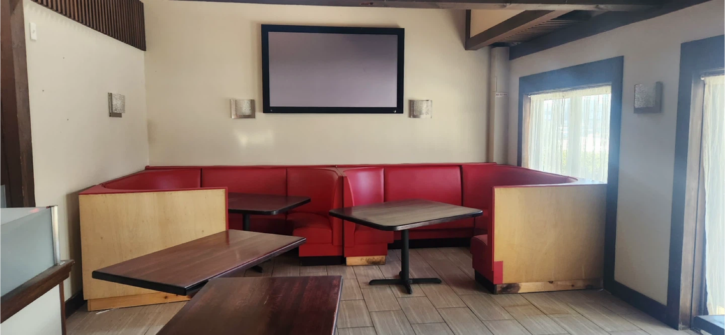 Red Booth Seating with Wood Accents