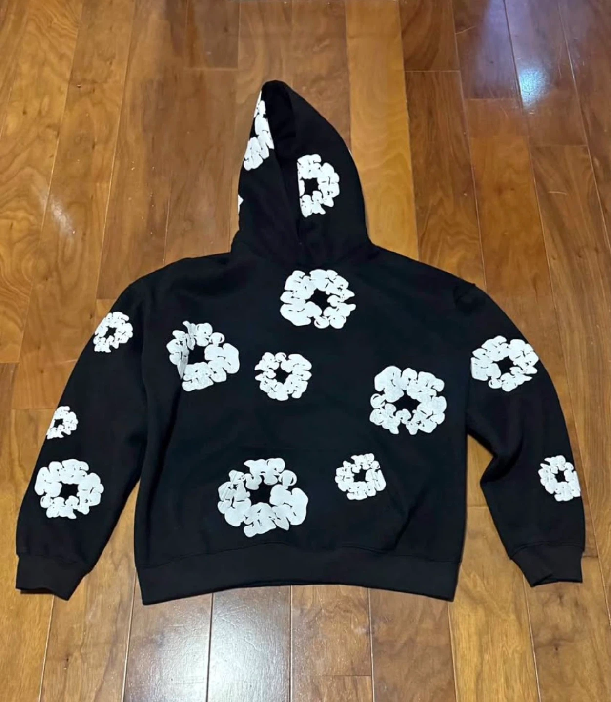 Black denim tears  hoodie with white floral pattern