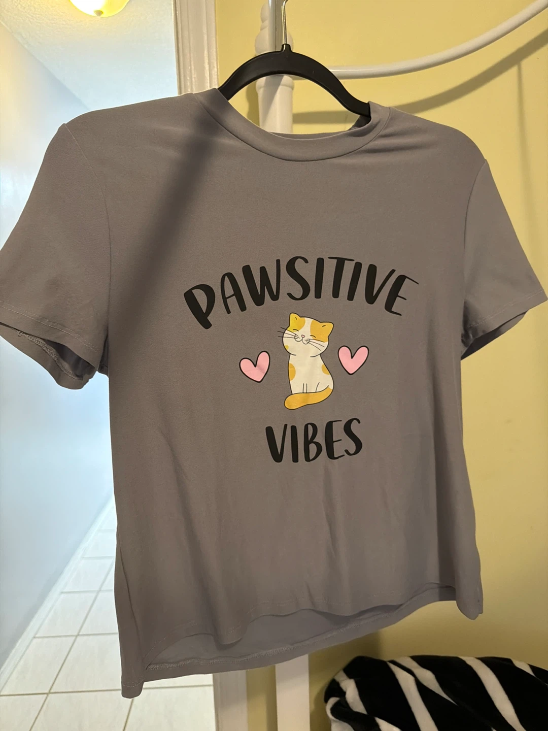 Grey T-shirt with "Pawsitive Vibes" cat graphic