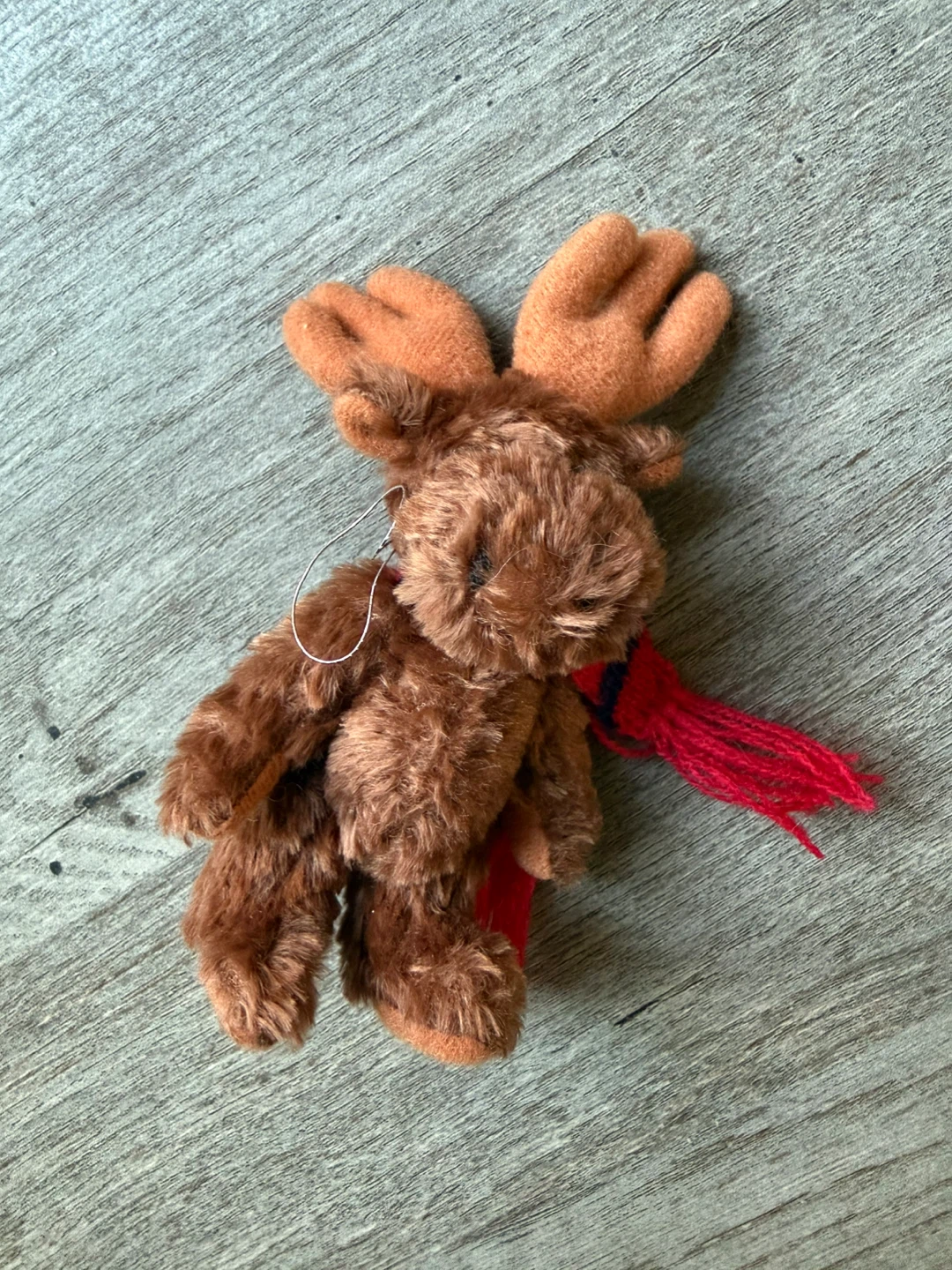 Small plush moose with scarf