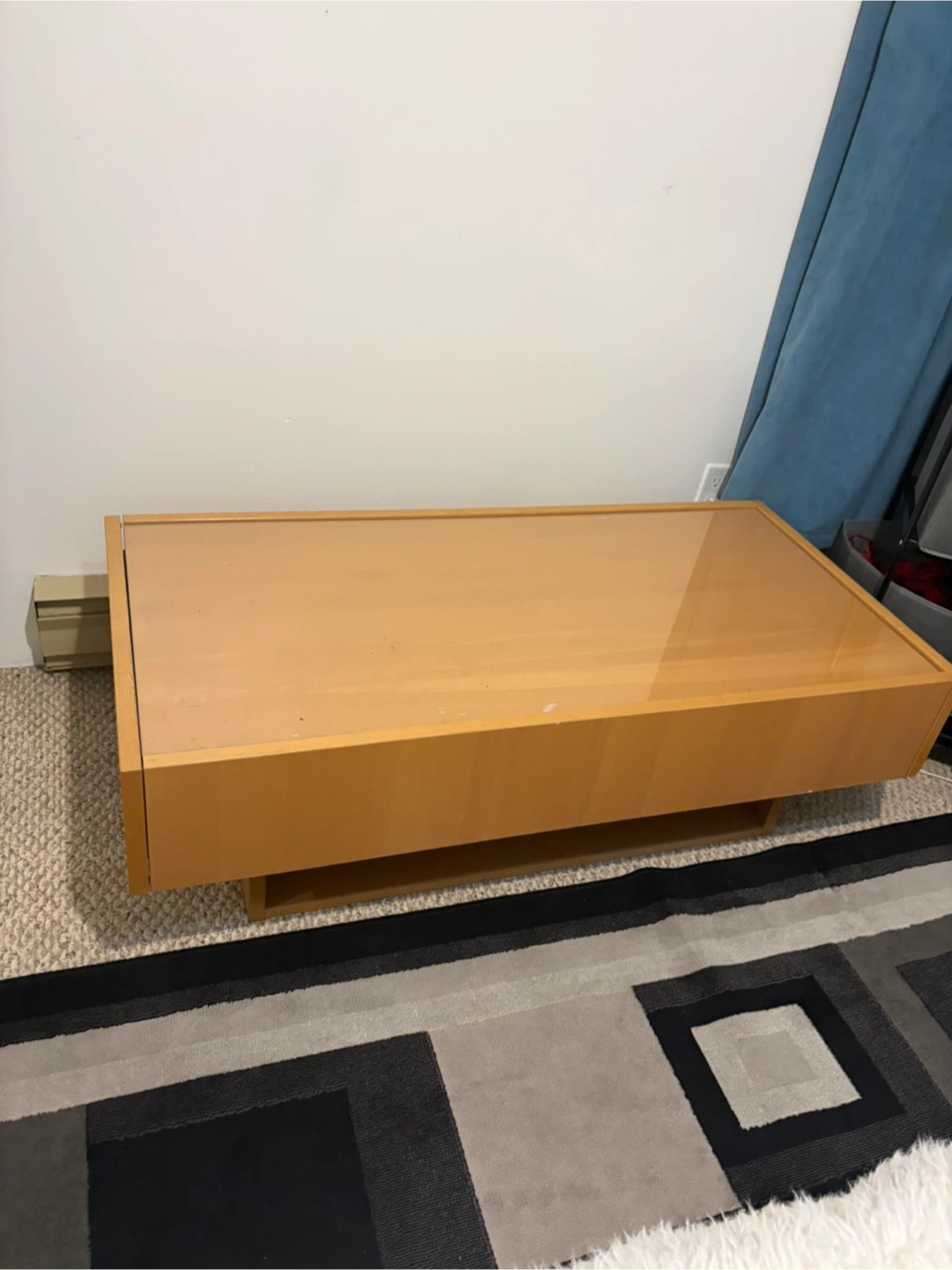 Mid-century modern coffee table with glass top