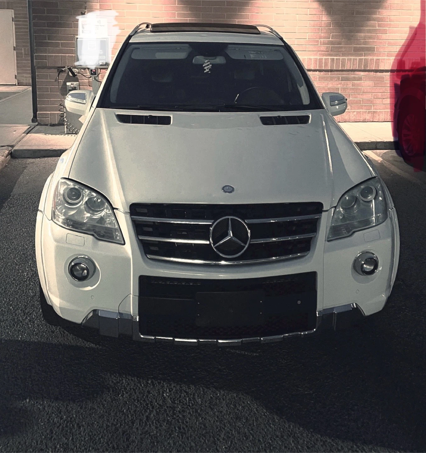 White Mercedes-Benz ML63 AMG SUV