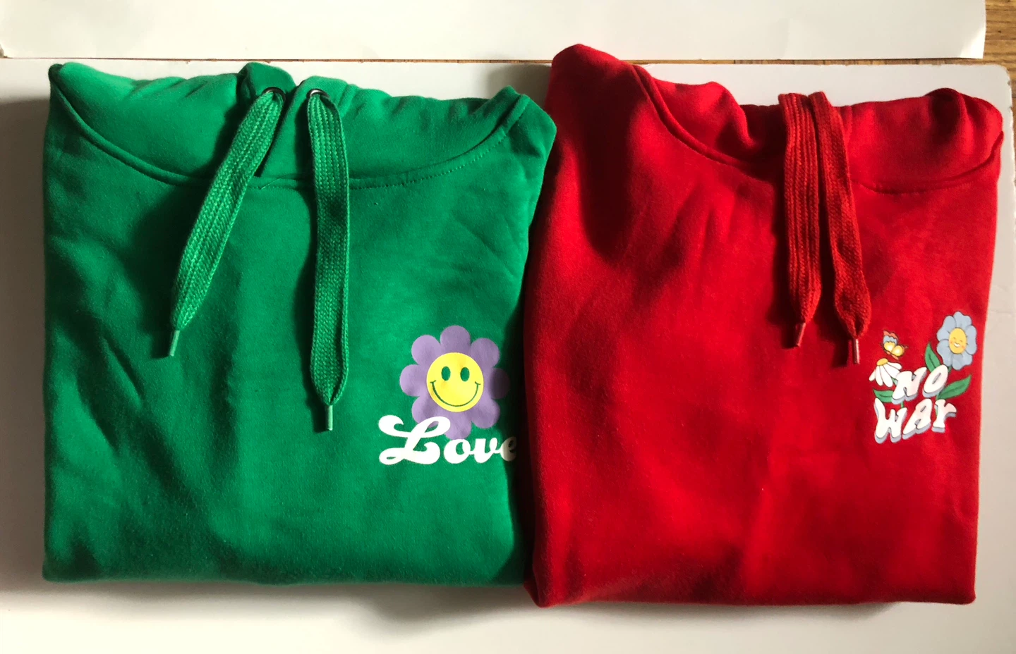 Green & Red Graphics Hoodie, Brand-new $8 each