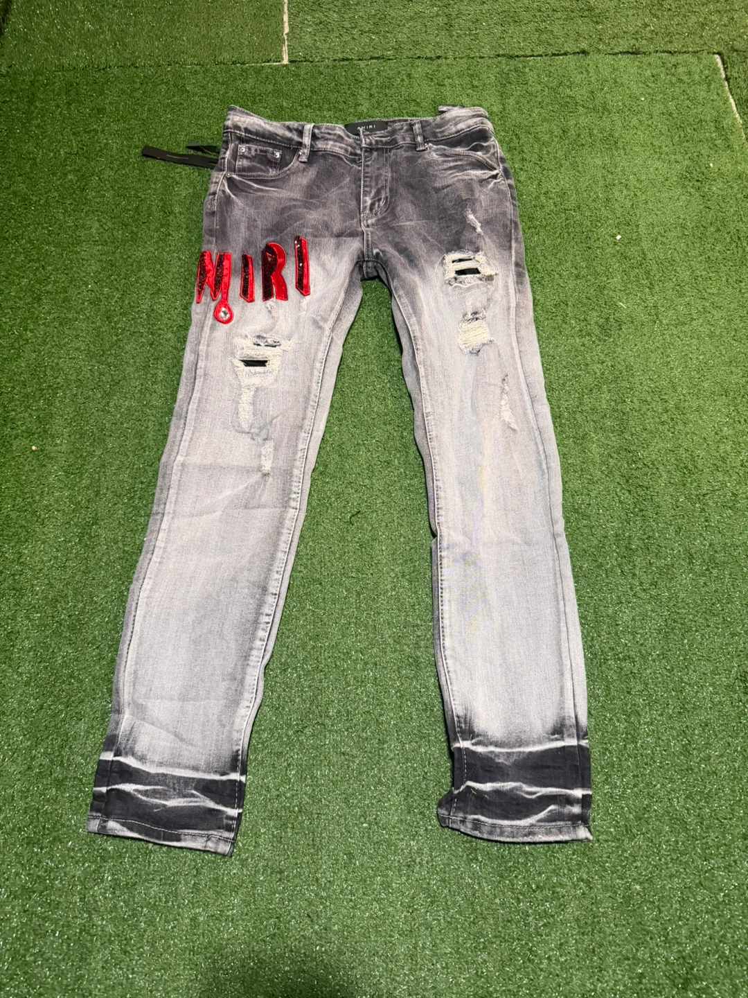 AMIRI Distressed Logo Jeans