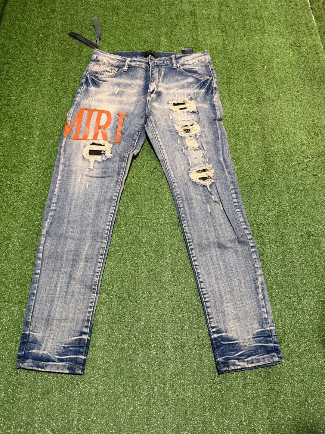 Amiri Distressed Logo Jeans
