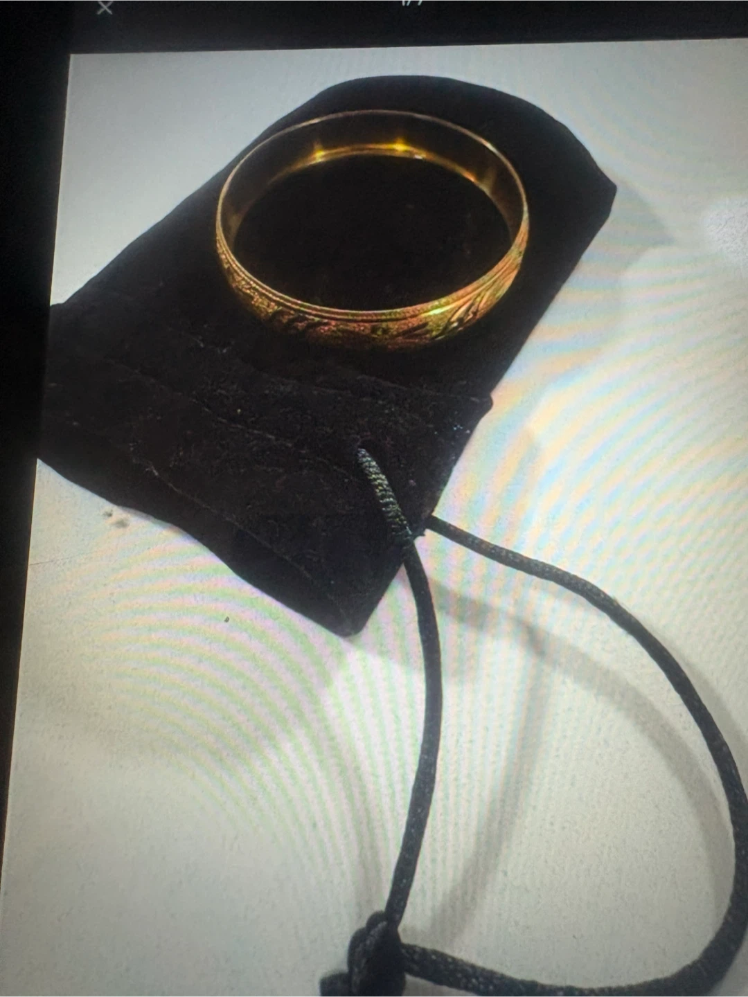 Bracelet  doré avec motif - photo 2