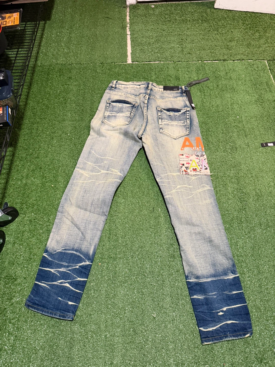AMIRI distressed blue jeans - photo 2