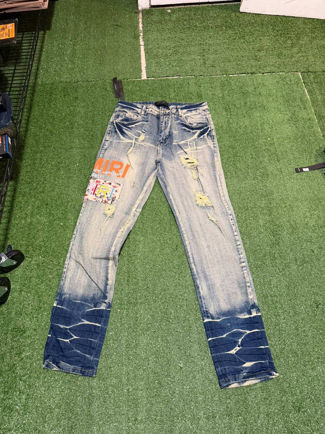 AMIRI distressed blue jeans