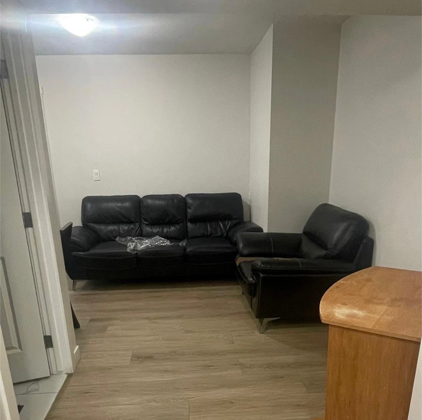 Black Leather Sofa and Armchair Set