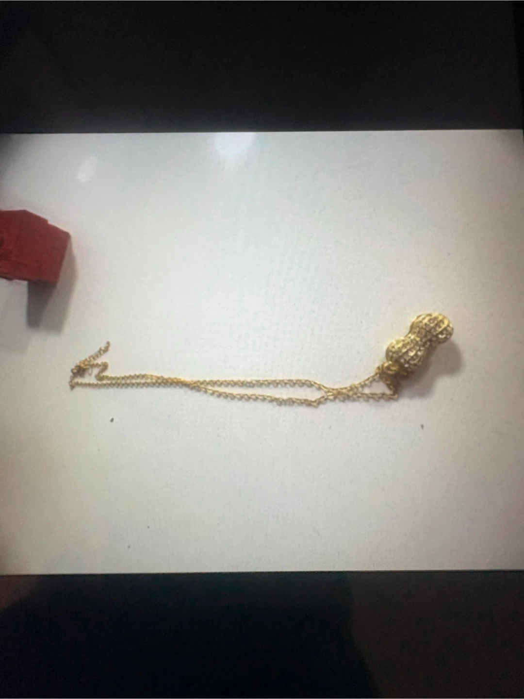 Collier plaqué or avec pendentif cacahuète et perles